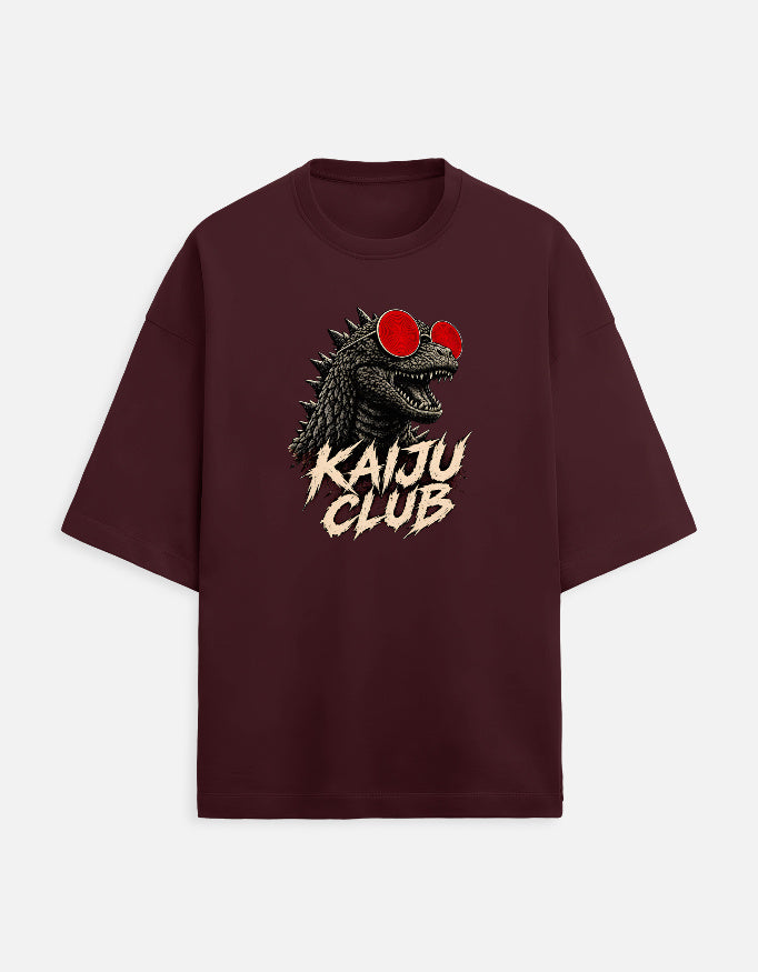 Maroon oversized Kaiju Club t-shirt with bold kaiju graphic and distressed lettering