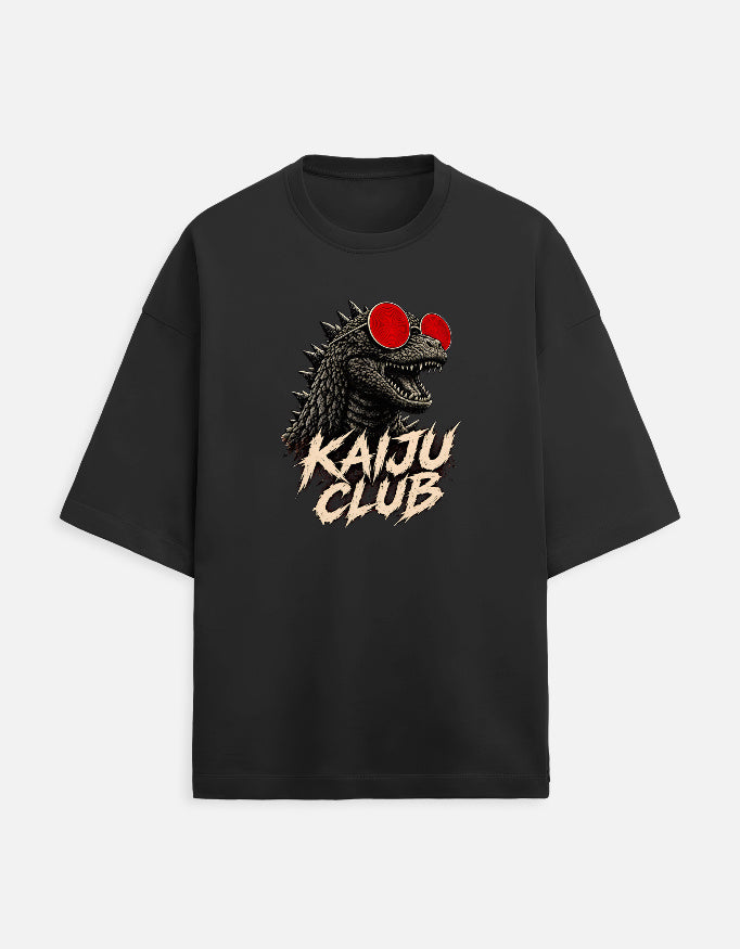 Black oversized Kaiju Club t-shirt with bold kaiju graphic and distressed lettering