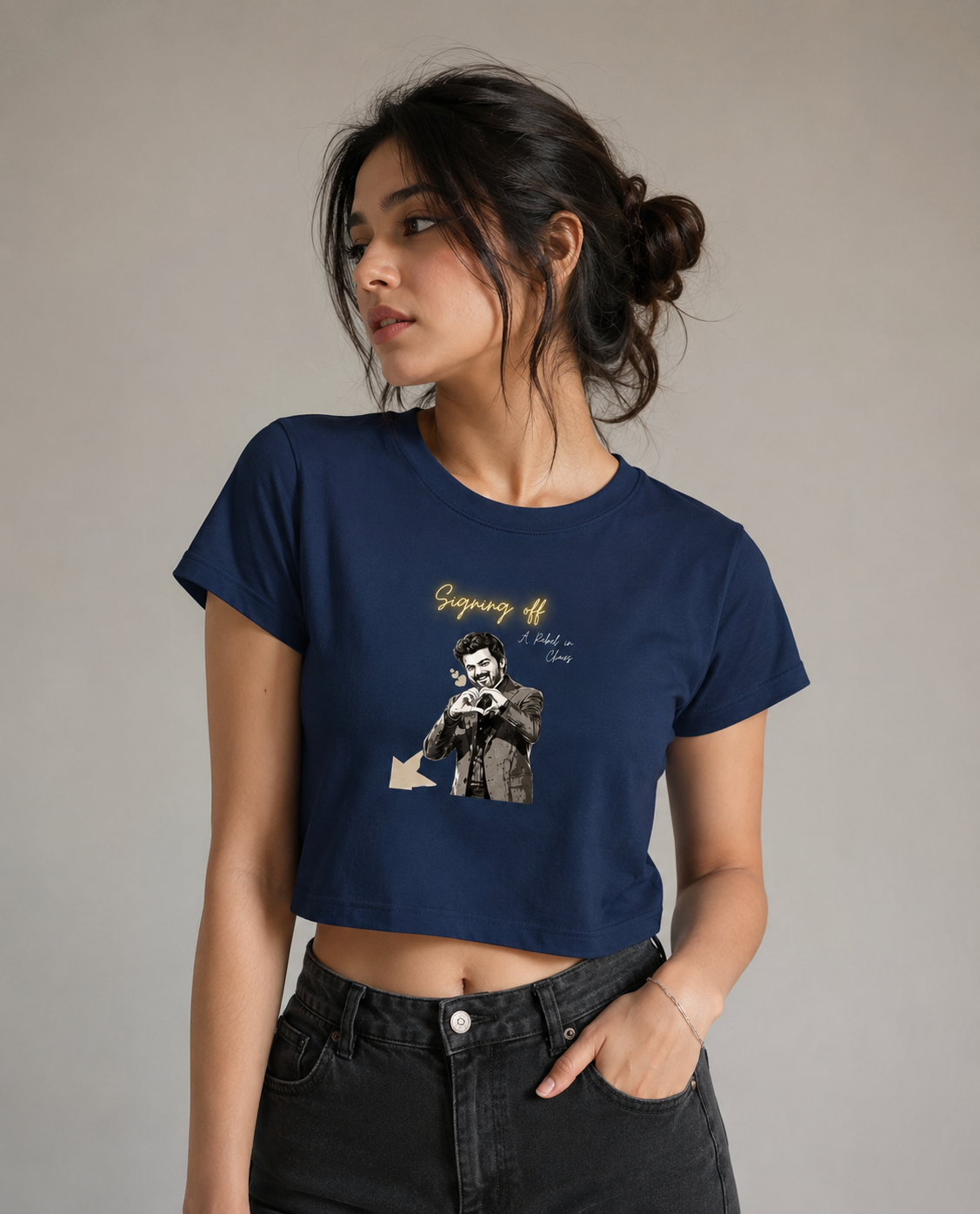 Women's blue crop top featuring the Signing Off graphic print with a monochrome illustration and glowing handwritten text on the front. Premium cotton casual streetwear.