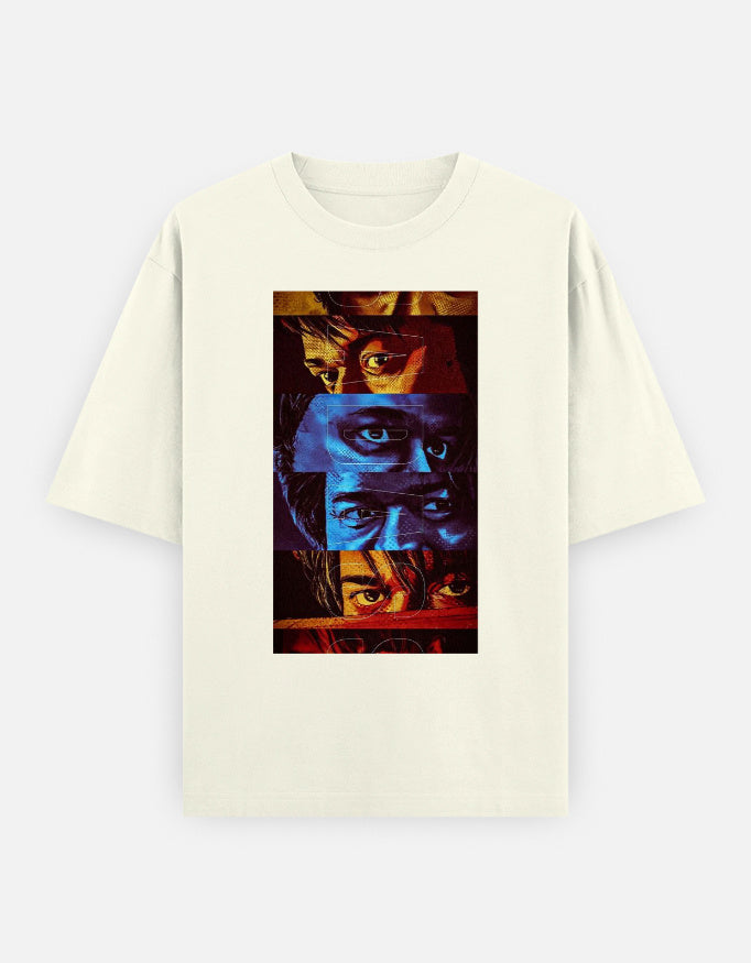 A off-white oversized premium cotton t-shirt featuring a bold multi-color eye collage graphic print on the front. Modern unisex streetwear by LowKey.