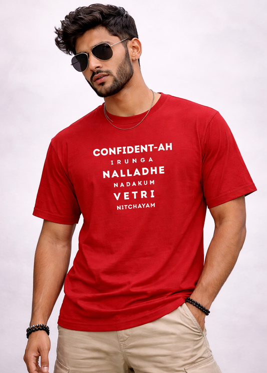 Man wearing a red t-shirt with white text on a plain background