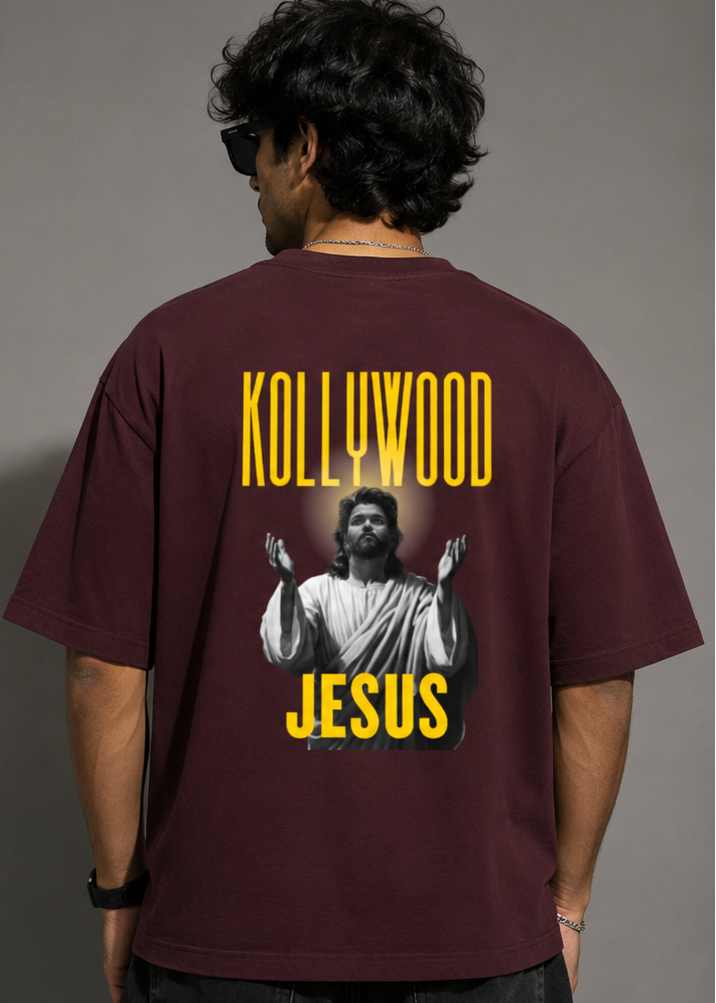 Model wearing oversized t-shirt with Kollywood Jesus graphic and glowing portrait print on back