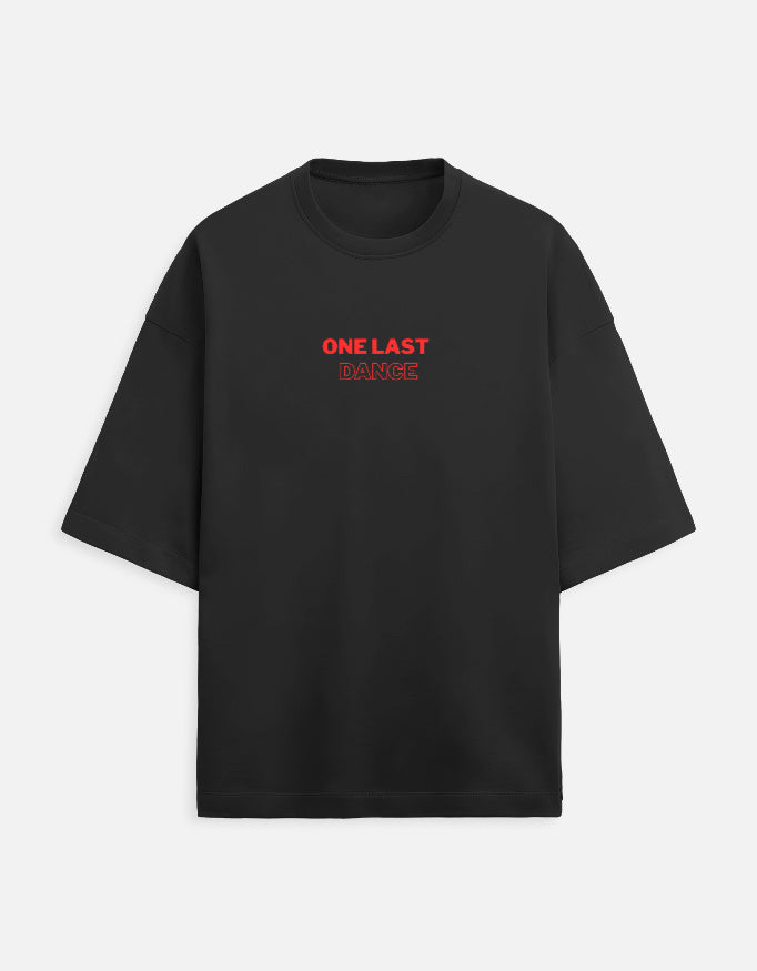 Black oversized t-shirt with small One Last Dance typography print on chest