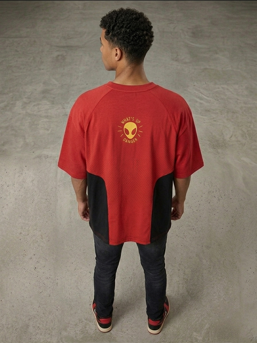 Man wearing Spider-Man Great Power red oversized t-shirt with quote graphic, back view