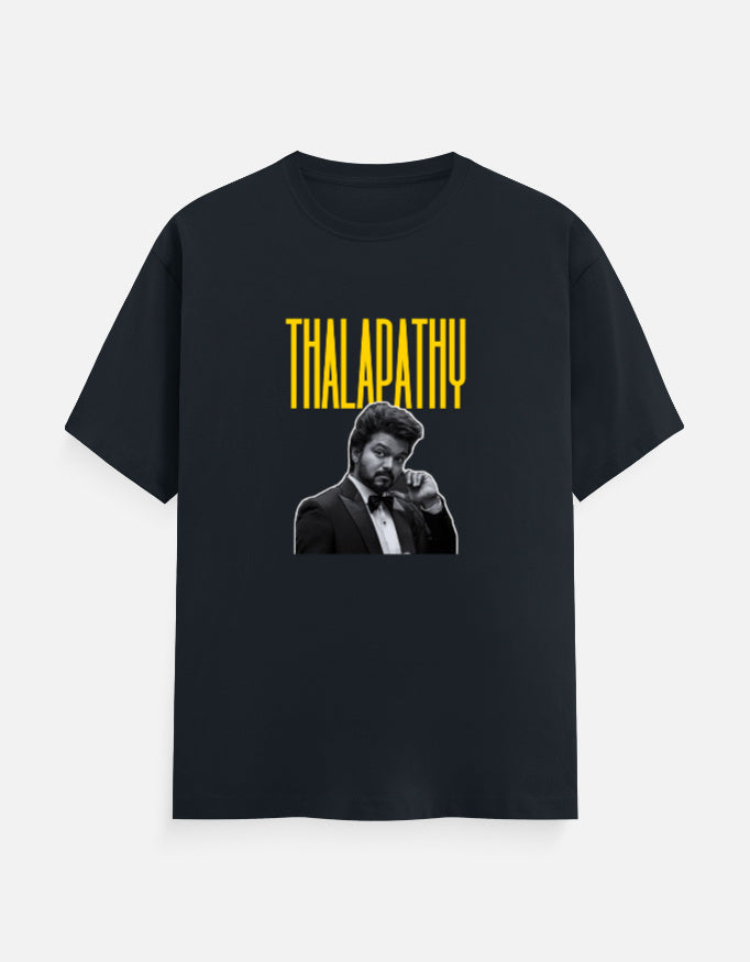 Blue oversized t-shirt with Thalapathy typography and black and white portrait print, front view