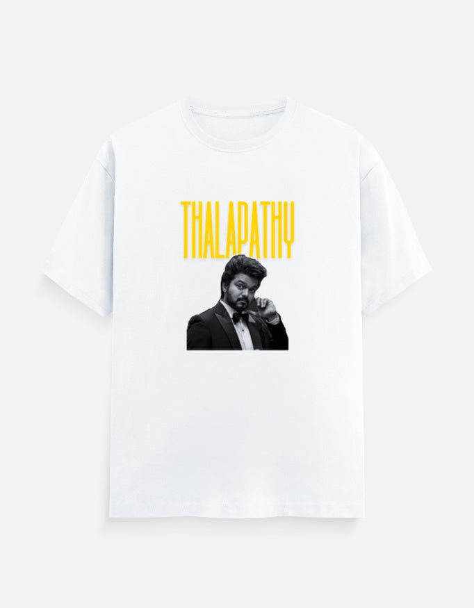 White oversized t-shirt with Thalapathy typography and black and white portrait print, front view
